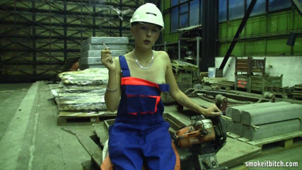 Smoke it bitch: Skinny blonde worker in the factory takes her break for...