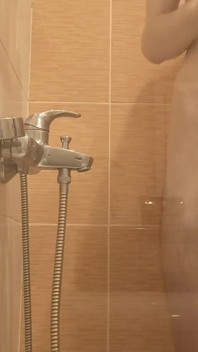 A Young Guy Washes in the Shower and Dreams of Someone Being Next to Him