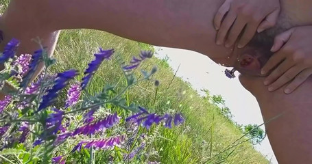 Thumbnail of Sexy Amateur MILF Butt Plug in Asshole and Pissing in Nature