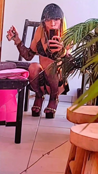 Show off a Beautiful Little Brothel Whore in Mini-skirt, Latex & Nylon Stockings, Black Stiletto Heels. Vanessabitchx the Slut O