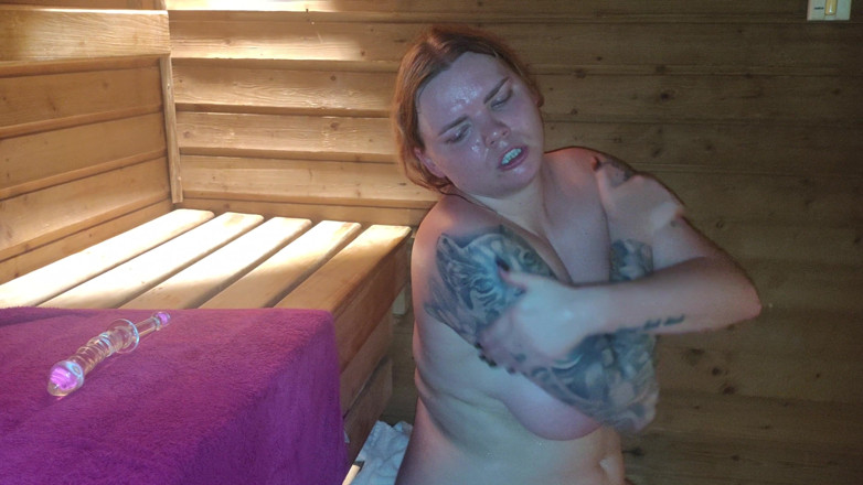 Bastet: Busty Girl Masturbates with a Glass Dildo in the Sauna...
