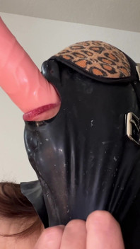 Masked Slut Sucks Dildos