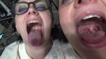 Goddess Misha Goldy: Two business women taunt you with their mouths & tongues before...