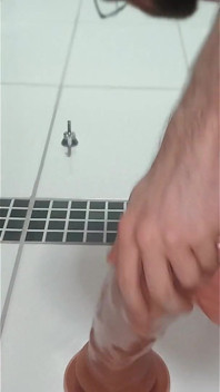 In the Bathroom Shoving the Dildos in My Ass