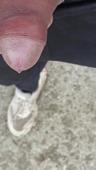 Friend Is Holding My Cock While Im Peeing on the Ground Outdoor
