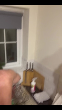 My Chastity Sub Washing the Pots for Me Naked in His Chastity Cage and with His Marigolds on