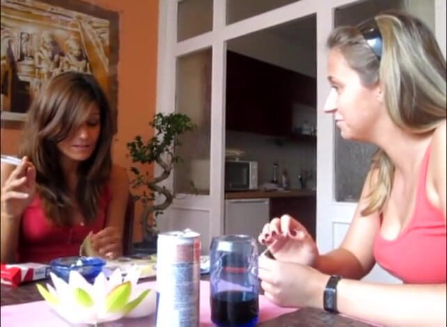 Femdom Austria: Brunette beauty smoking cigarettes