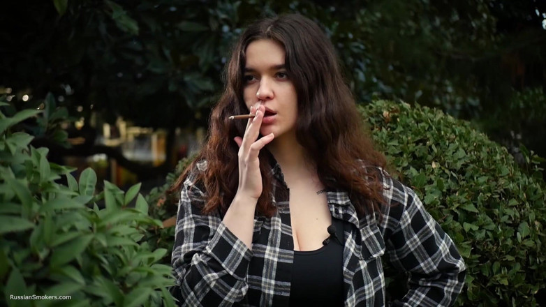 Russian Smokers: Sweet and Busty Russian Babe Smoking Cigarette in Nature