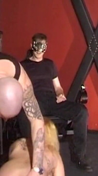 Blonde MILF Submits Fully to Tattooed Dungeon Masters