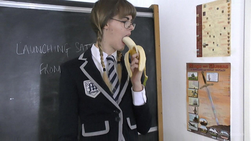 Melissa Eats a Large Banana in Class (St Mackenzie's Archive)