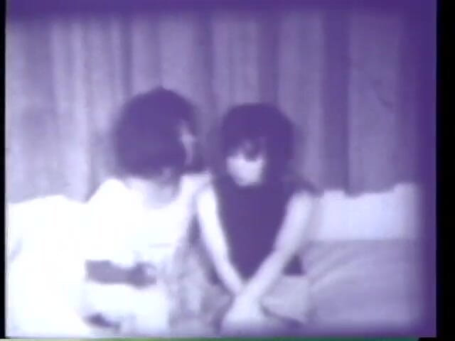 Vintage Usa: Vintage 3some with horny black & white milf and strapon dildo (No audio...