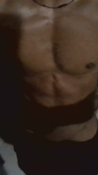 Showing His Abs and Core Area