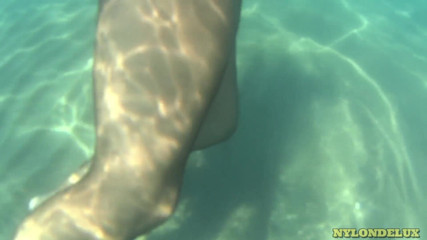 Nylondelux: Black Pantyhose Rip in the Sea