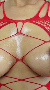 Nippelspiel in Rotem Bodystocking