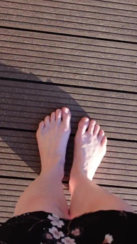 Walking with My Feet on the Grass and Showing Them to You up Close