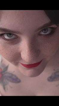 A Girl Is Messing with a Macro Camera