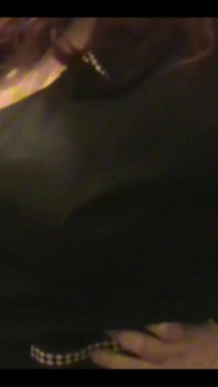 Robe-wearing Dominatrix