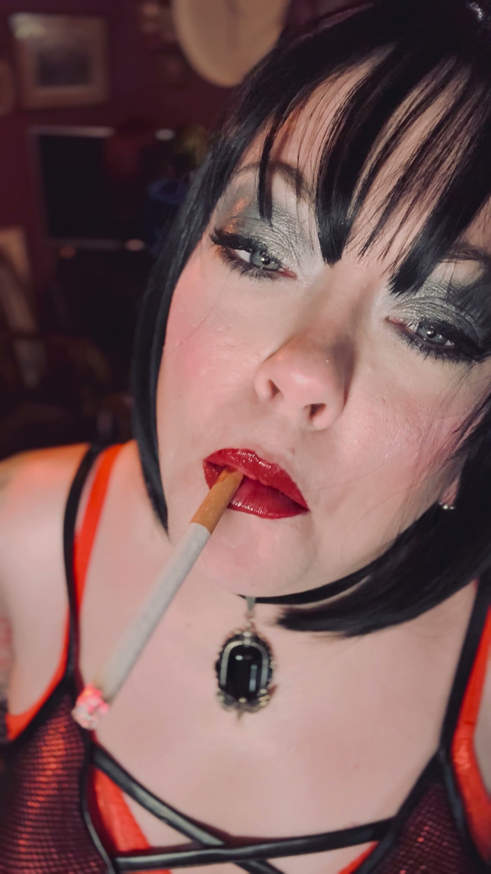 Tina Snua: Smoking Mistress Tina Snua Chain Smokes 2 Superking Cigarettes in Fishnet...