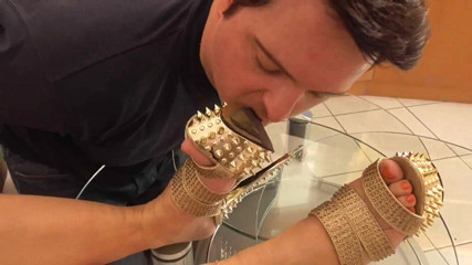 Foot Girls: Mistress lets her slave lick her golden shoes