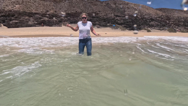 Emma Voyeur: Girl Wetting Jeans in the Ocean and Swimming in Wet...