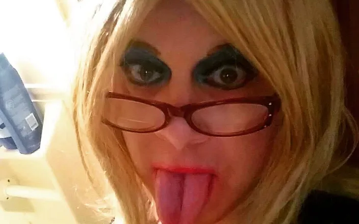 Krissy Sweets: Sexy crossdresser Krissy Sweets in lingerie and high heels with...