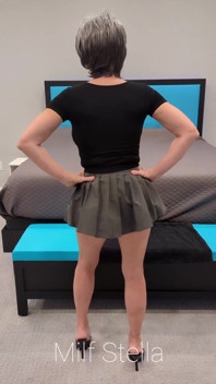 Sadie in a Grey Mini Skirt with a Black Top & Heels