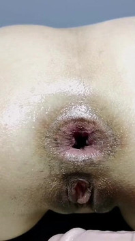 Dominatrix de látex follando culo y mostrando coño