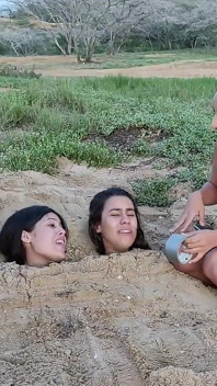 Buried by the Beach Bitches!