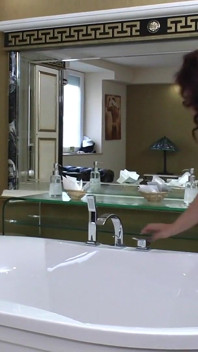 Curvy Mature Redhead Adelina Shows off Her Big Butt and Fingers Herself in Bath