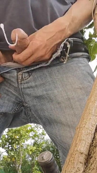 Hiding Outside Behind a Tree to Jerkoff with Huge Cumshot