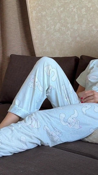 Farting in Pajamas on a Pillow While Sitting on the Couch