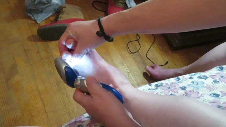 BBW nurse Vicki adventures with friends: Nurse Vicki grinds her toe nails down with her electric...