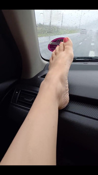 Feet on the Dashboard. a Little Peek at My Legs