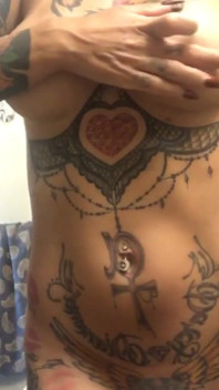 Busty Tattooed Babe