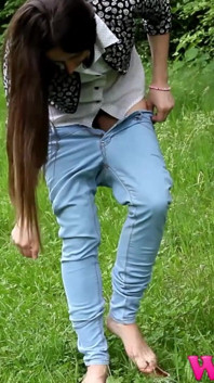 Diana Pee on a Rock in the Forest and Then She Dress Pulling up Her Tight Jeans