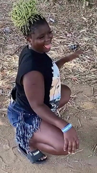 African Ebony Sexy Black Girl Dances in Public with Laughter