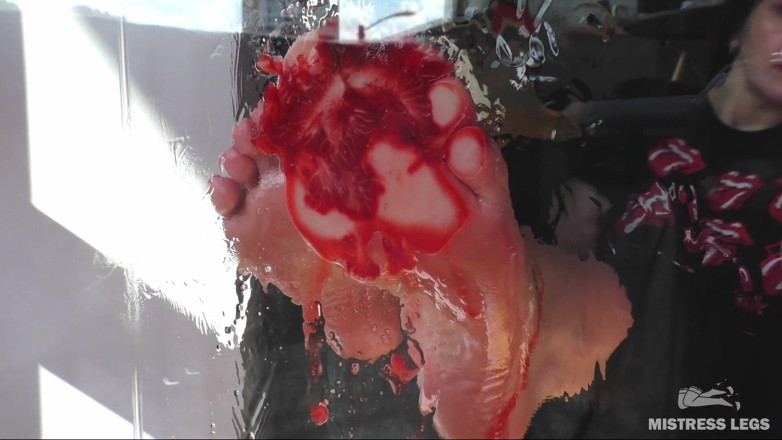 Mistress Legs: Mistress barefoot soles rubbing against the glass and squeezing strawberries