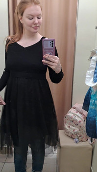 What Words Pop Into Your Head When You Look at the Red-haired Mistress in the Black Dress?