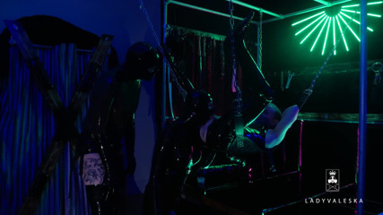 Lady Valeska: The rubber Domme the giant dildo and the gimp
