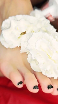 Two Lesbians Licking Whipped Cream off Each Other's Feet