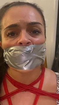 Latina Tied up and Gagged with a Tape Wrap (smaller Size)