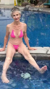 By the Hotel Pool in My Skimpy Pink Bikini