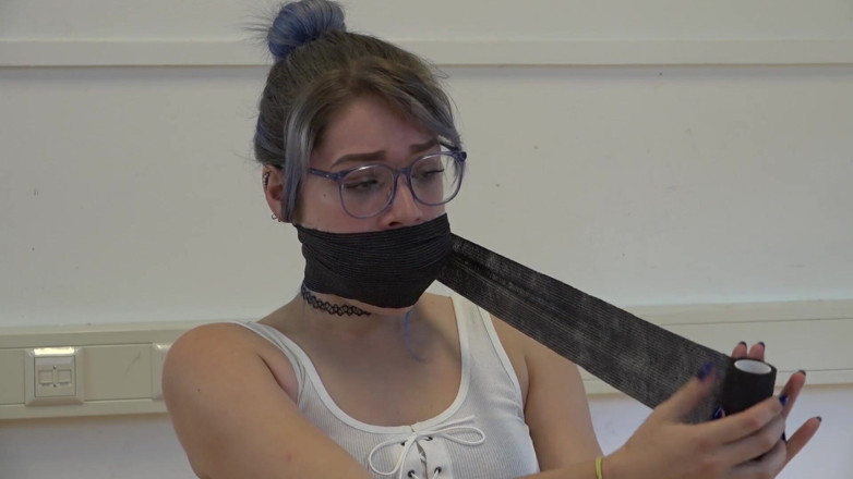 Restricting Ropes: Gagging herself with socks up close