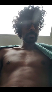 Masturbating