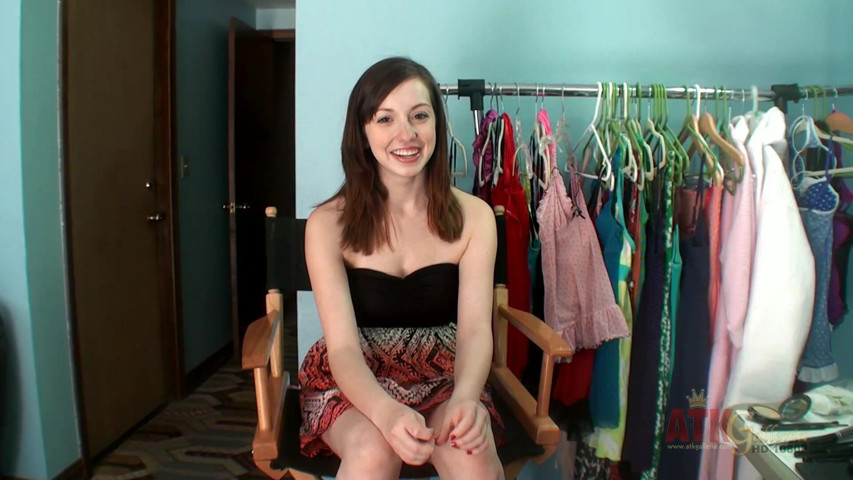 Ally Evans talks to an interviewer before she strips down in the bathroom, spreads her pussy, and pisses in the sink