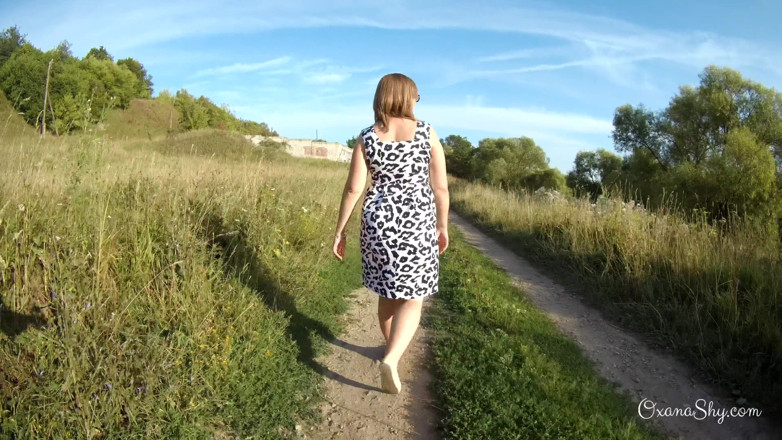 MILF Oxana: Flashing and naughty fun at the riverside