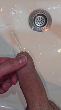 Pissing to the Bathroom Sink