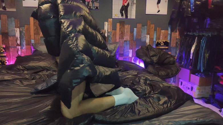Evilshaman: Cock Rubbing Down Jacket on Shiny Nylon Bed