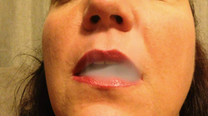 Lily Lipstixxx: Catching you in my smokey seduction!