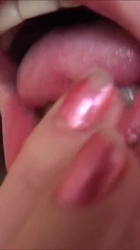 Sexy mature masturbating with her fingers in close up